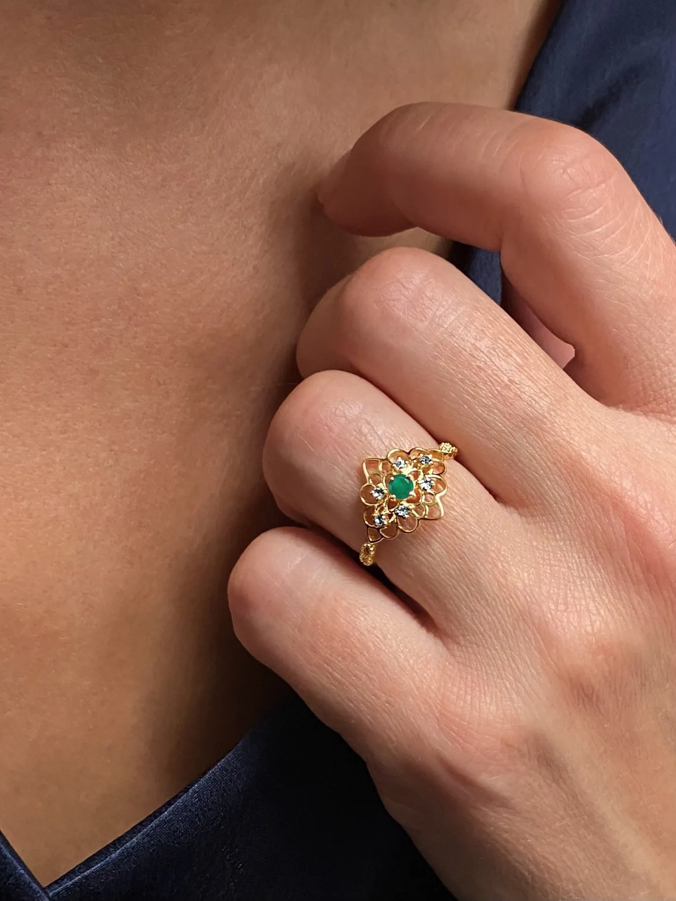 9k Yellow Gold Ring Set with White Topaz and Emerald