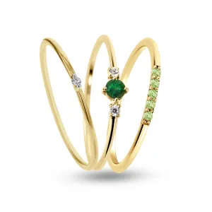 Composition of rings in 925 Silver gilded with 18k yellow gold assembled with HSI Diamond, Emerald, Peridot and Zirconium Oxide