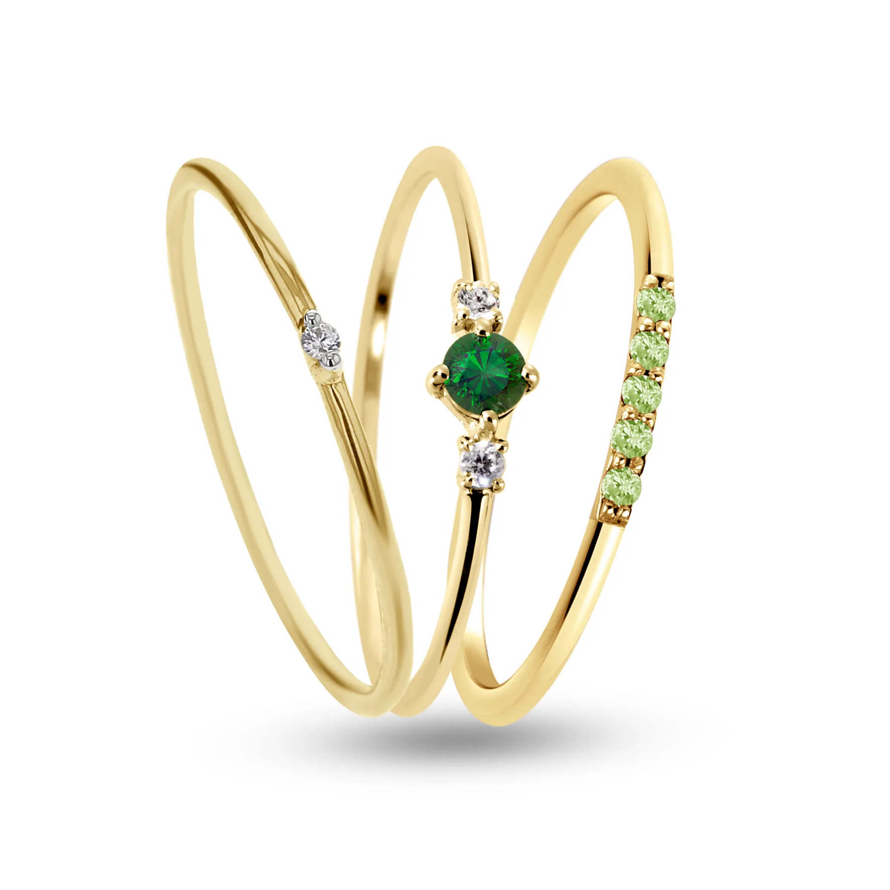 Composition of rings in 925 Silver gilded with 18k yellow gold assembled with HSI Diamond, Emerald, Peridot and Zirconium Oxide