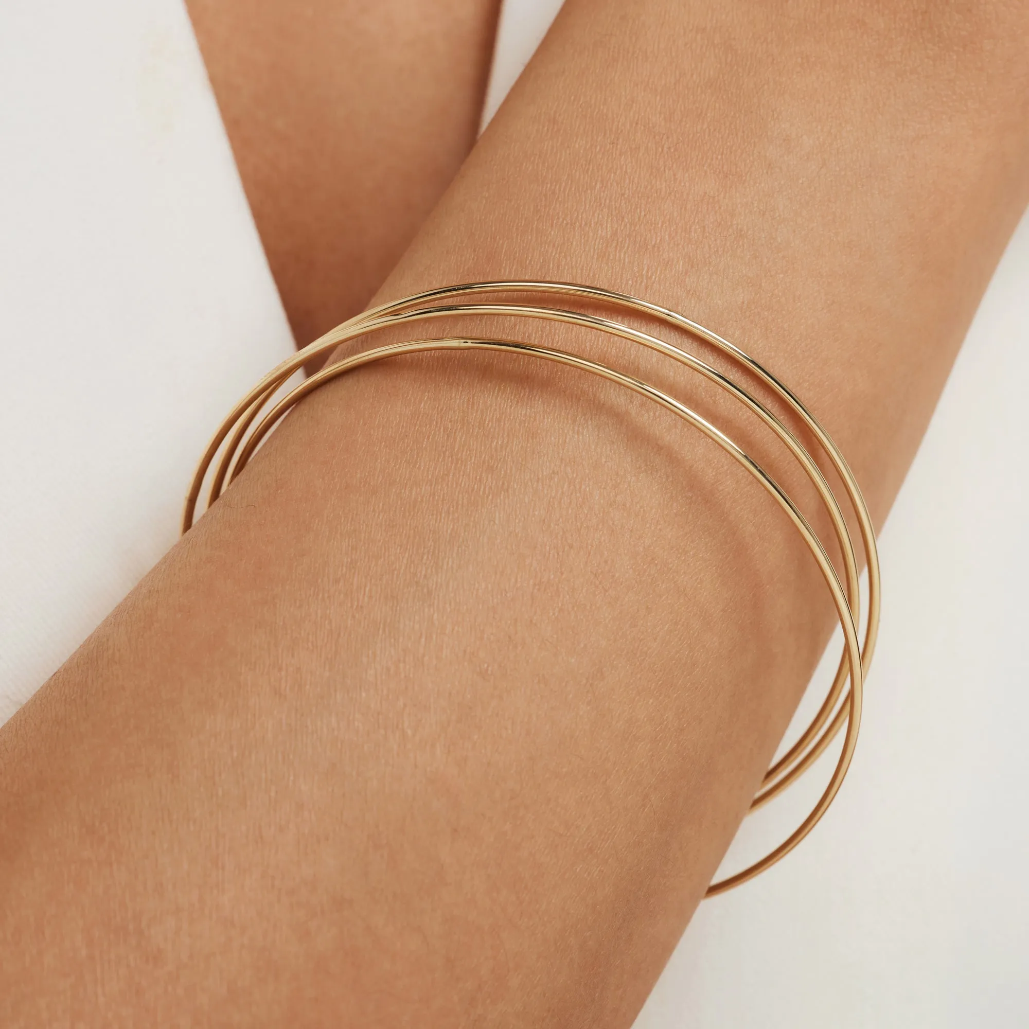 Cour d'Honneur Adora 14 karat gold bangles with 3 bracelets