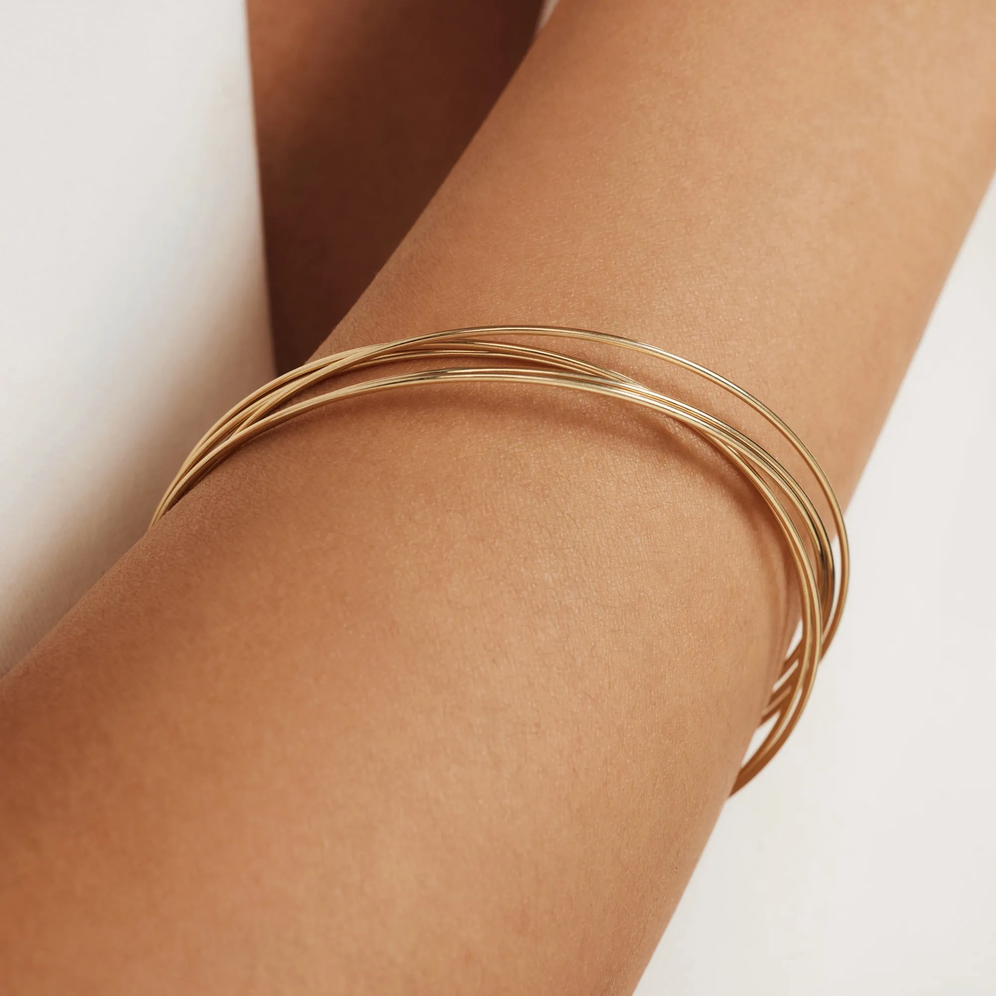 Cour d'Honneur Adora 14 karat gold bangles with 3 bracelets