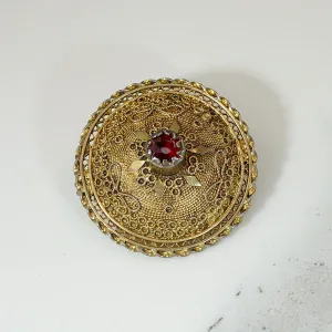 Etruscan Revival Garnet in Silver Gilt Filigree Brooch